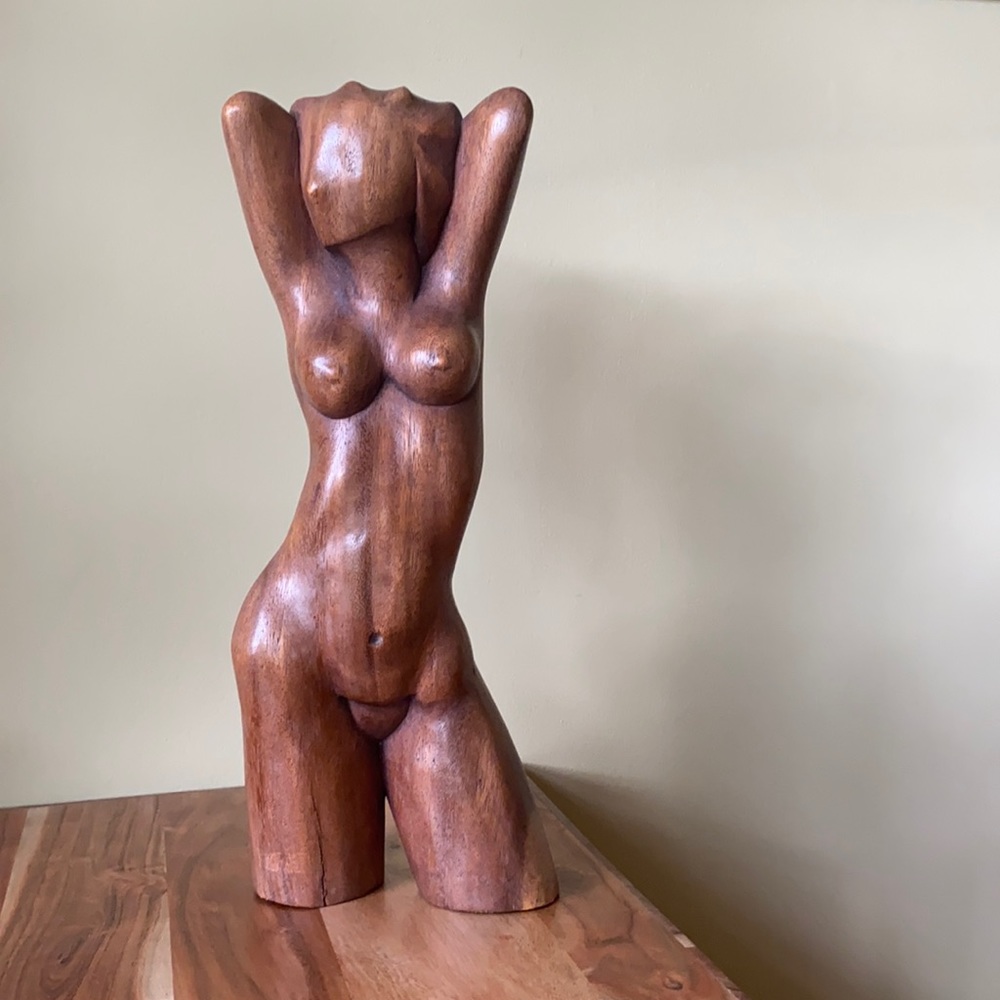 Female figure carving